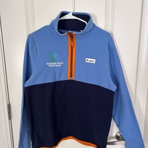 Cotopaxi Navy and Light Blue Pullover with Orange Zipper